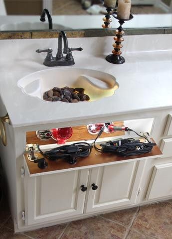 Built-in hair appliance storage- this should be in every woman's bathroom! I'm sold on this one!