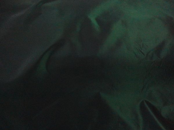Two Tone Iridescent Dark Green Acetate Taffeta fabric 48" wide. $5.00, via Etsy.