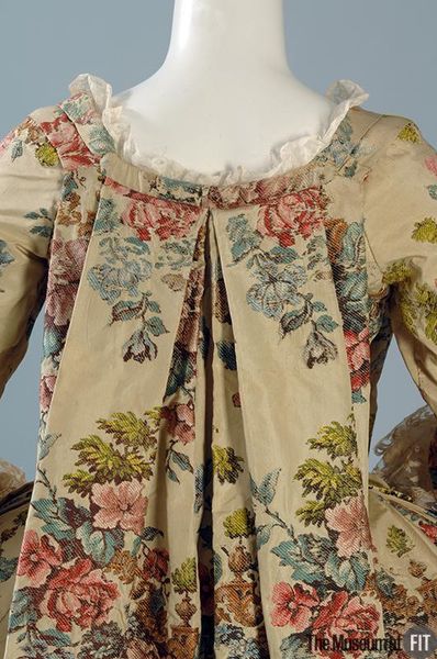 Detail back view, robe à la francaise, France or Italy, c. 1735. Cream silk taffeta brocaded with …