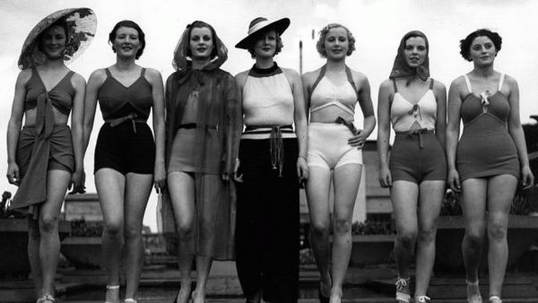May 1936: A line-up of beach fashions at a London display. (David Savill/Topical Press Agency/Getty…
