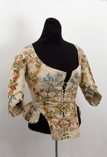 c. 1780 brocade caraco- style jacket. fashioned from plush brocaded silk damask and expertly pieced…