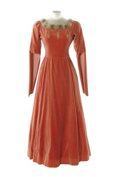 Dress    Fur trimmed velvet dress, c.1895. This dress of peach coloured cotton velvet was made to a…