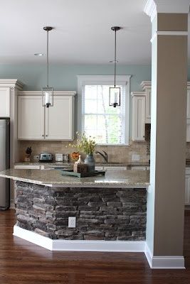 putting stone under the bar counter makes sense to minimize scuff marks when people are seated on s…