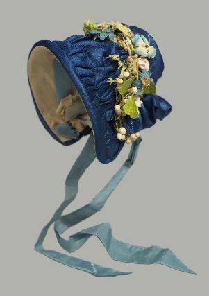 French about 1840  6.5 cm (2 9/16 in.)  Doll's bonnet of dark blue satin faced with yellow taffeta …