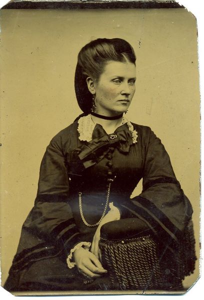 Beauty with handtinted cheeks.  Early 1870s