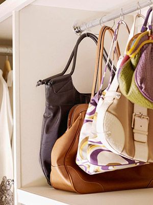organizing purses with shower rings...genius!