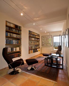 Library with Recessed Bookshelves mediterranean-living-room