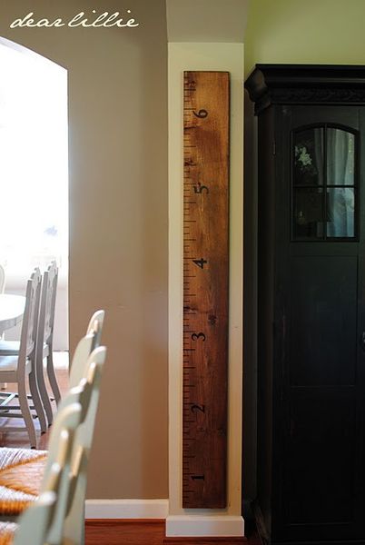 Cute DIY: Turn a 2x4 into a large ruler for the wall, and record the height of your kids as they gr…