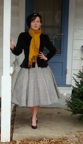 Awesome blend of vintage and modern style (scarf, no hose), particularly keeping the impact of the …