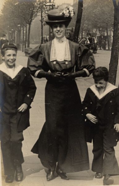 Cromwell Road London, 15 May 1907. A middle class married woman with her two sons in sailor suits. …