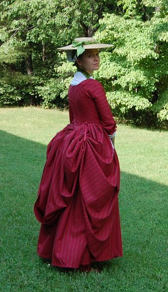 Bright polonaise gown.