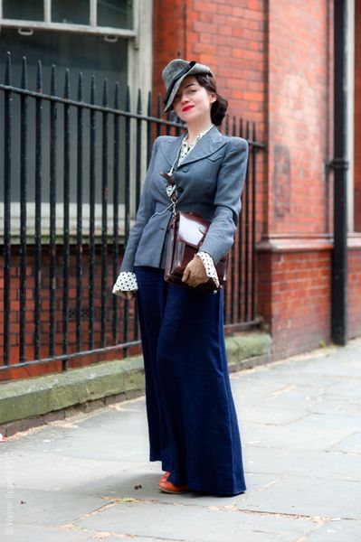 Basha wearing a 1940s Savile Row jacket with Palazzo pants and tilt hat (Wayne Tippets) #London #vi…