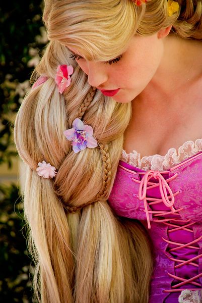 Rapunzel portrait taken at WDW -(How bad is it that my first thought was "How heavy is that hair?" …