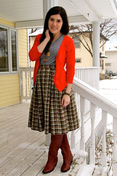 Plaid tweed skirt, boots, and brilliant color on top
