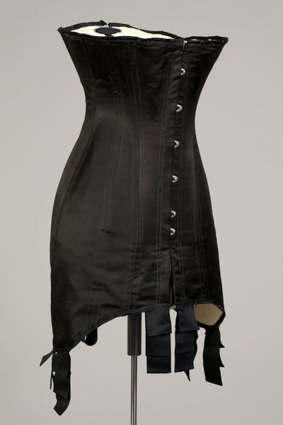 Corset. American, ca. 1910. Black silk with steel boning. Gift of Warnaco, Inc., KSUM 1983.1.117b