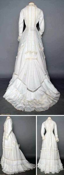 ca. 1870s. White cotton trimmed with cream bobbin lace. One piece, princess cut. Low bustle back, t…