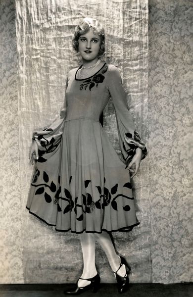 Women's Fashion. Dress with wide skirt from the Spring 1929 collection.