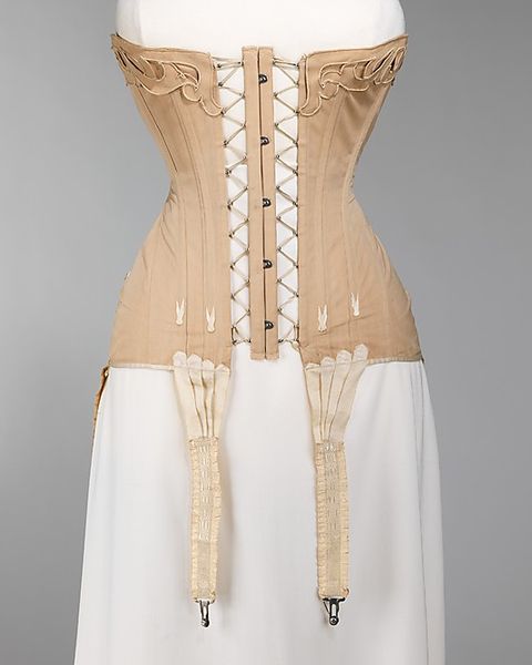 Corset, 1904. MET. "The front-lacing, as opposed to the usual back lacing, is highly unusual for th…