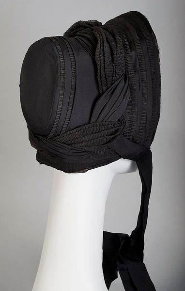 Mourning bonnet of black silk crepe and taffeta, American, ca. 1860, KSUM 1995.17.447. This mournin…