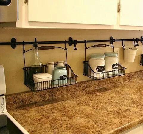 By hanging curtain rods and holders, you're able to eliminate the clutter on your kitchen counter. …