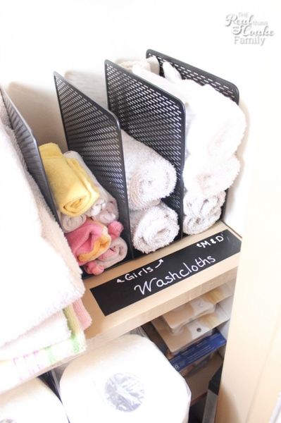 Linen Closet Organization - Great post showing how to maximize a small space for a family.
