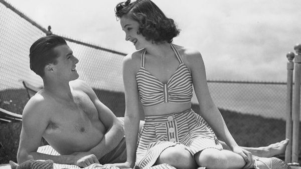 Circa 1950: Couple relaxing on a sailboat. (George Marks/Retrofile/Getty Images)
