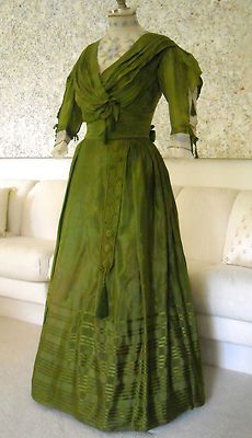 Edwardian Era: Under blouse is a blue and green floral print on sheer cream net. It has a high neck…