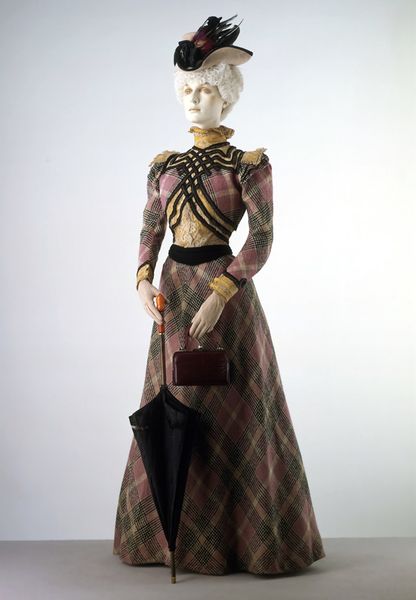 Costume in wool check France c.1897 Wool, trimmed with ribbon, braid and machine-made lace; bodice …