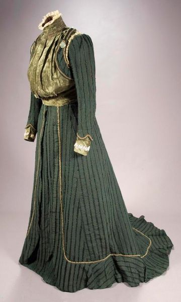 1903 Walking dress, Seville, Spain. Bodice of green corduroy, velvet, and guipure lace. Silk skirt …