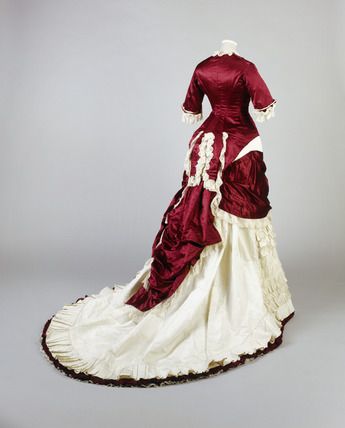 c.1874-1879 Deep red silk and ivory grosgrain evening dress, back view