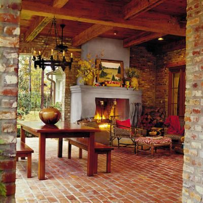 I love the fireplace and brick . . . how wonderful would this be for entertaining!