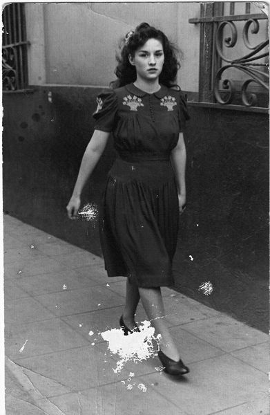 Girl in the street. 1940s.