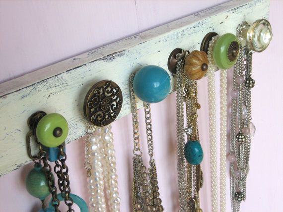 Necklace Holder. I love the different knobs!