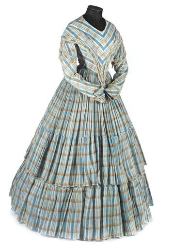 1840s one piece gown, the fabric sky blue and tan check, the dropped shoulders and deep pointed bod…