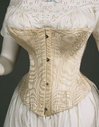 Women's Corset    Probably made in United States  c. 1860-70s.  White silk moiré; baleen; metal bu…