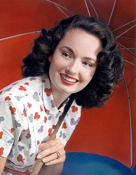 Ann Blyth rocking a cute novelty print blouse and vibrant red umbrella. #vintage #1940s #actresses …