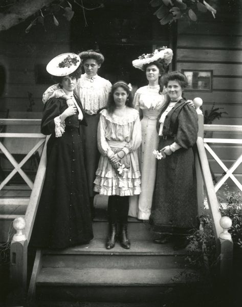 Early 1900s - Spiffy ladies of the family gather on the porch for a photo.. (c. 1910?)