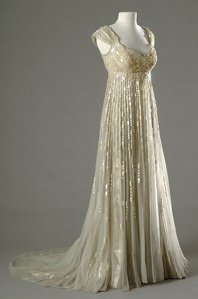 Merle Oberan wore this gorgeous champagne-colored empire gown in the 1954 movie,