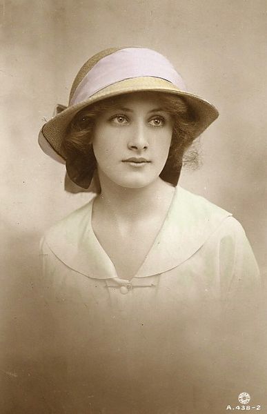 An old French postcard  depicting an exceptionally lovely young lady that was produced sometime dur…