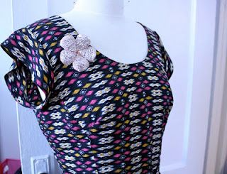 Adding a band sleeve to a sleeveless dress or top.