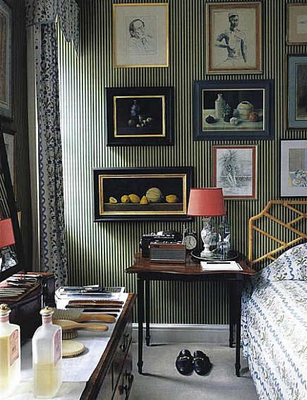 Masculine bedroom. Stripe wallpaper. Gallery style picture wall. Artwork.