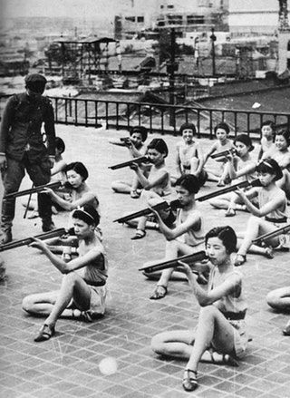 Japanese girls receiving shooting training during school in the 1930s. : OldSchoolCool